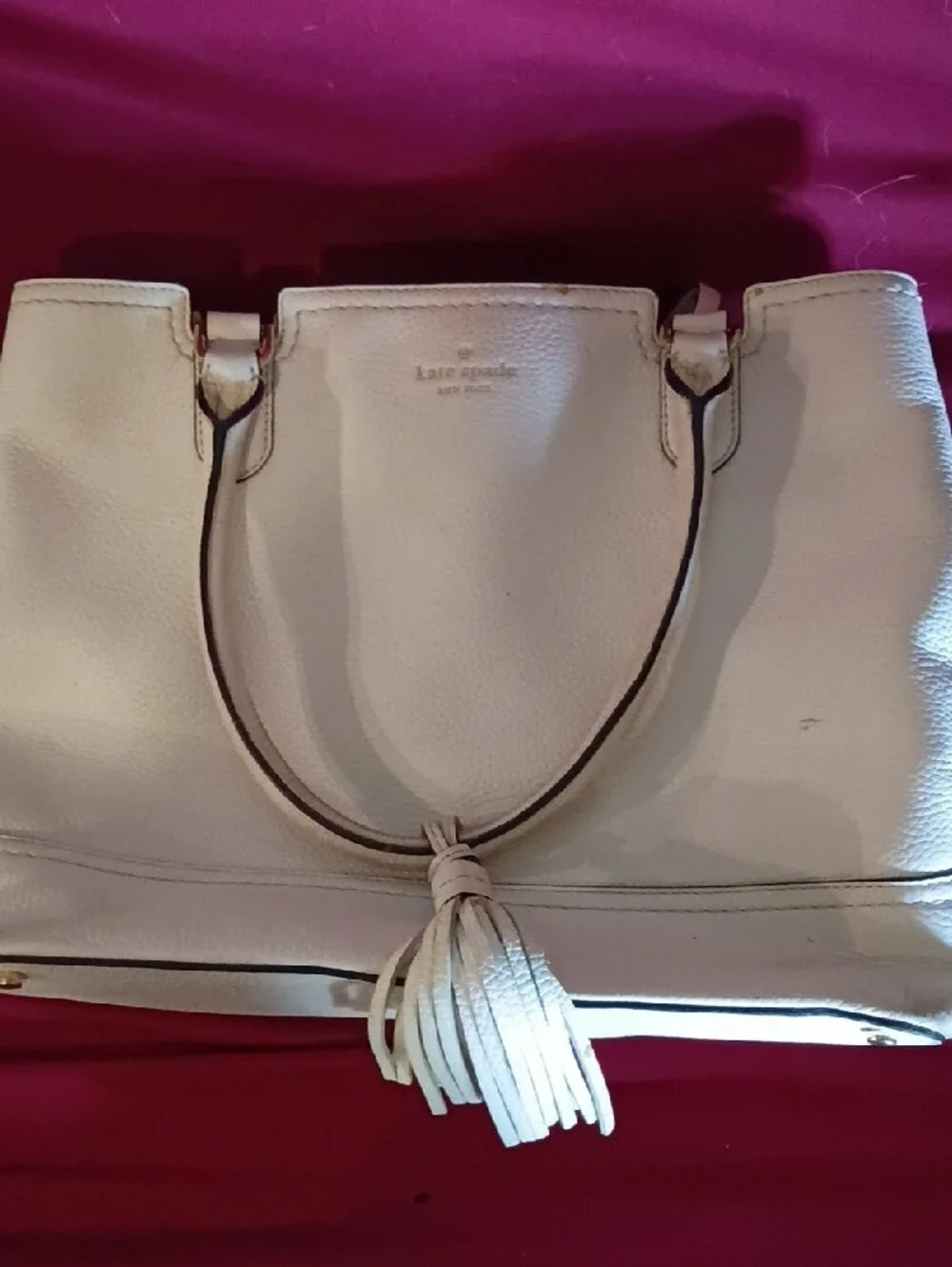 kate spade cream pebble leather tote with tassel